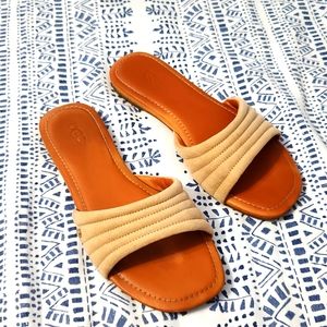 UGG slip-on sandals. Tan uppers with leather footbed, rubbers soles.